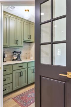 green cabinets and drawers