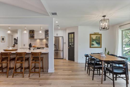 wood dining table and barstools