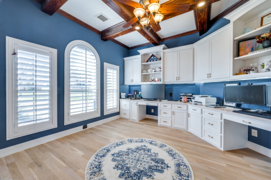 office space with blue painted walls